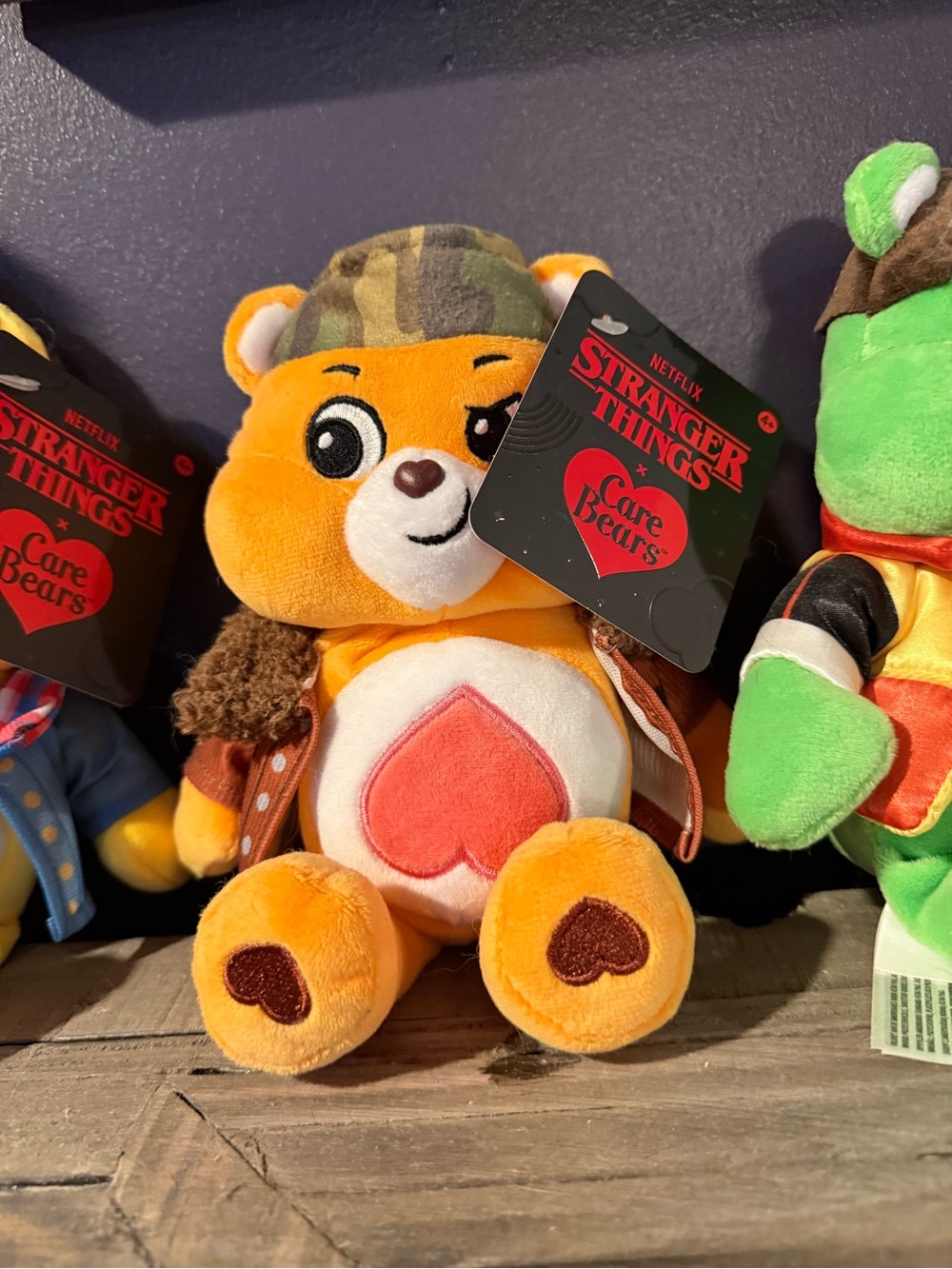 “Lucas” Care Bears Orange and Pink Heart Plush - Stranger Things Tag